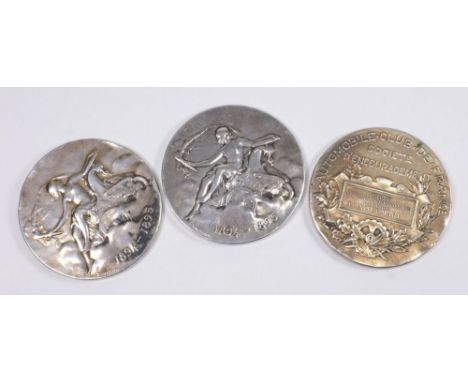 Three French silver Automobile Club medallions by Daniel Dupuis:, obverse with a nude torch carrying female in a chariot , da