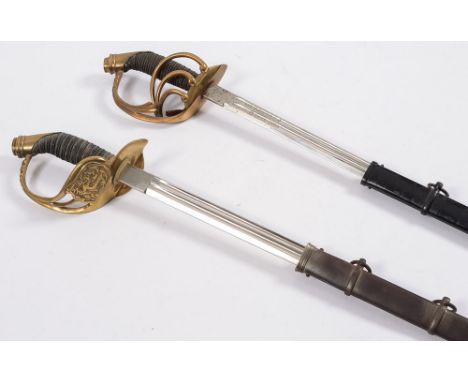 Two late 19th century Prussian Infantry swords,one by Edwald Gleff, the other by E & F Horster:,  both with bi-fullered blade