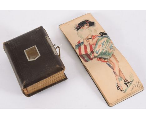 A Victorian leather bound Carte de Visite album with portrait photographs and an early 20th century autograph album:.