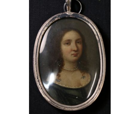 Late 17th / early 18th century miniature portrait of a lady, oil on copper, unsigned, 7cm x 5cm, oval in white metal locket. 