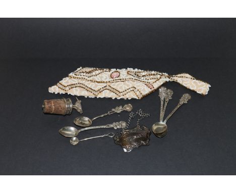Silver mounted bottle cork, 1962, a decanter label "Whisky", Birmingham 1872, six silver spoons and a purse. (9).