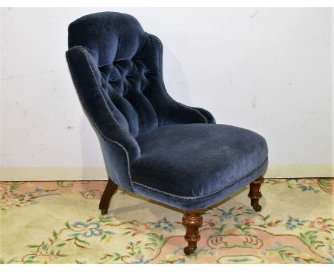 Victorian upholstered button back chair, on walnut supports with brass castors, makers stamp to rear support 'CVS'  (possibly