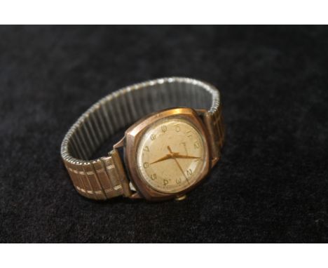 Gent's Helvetia 9ct gold watch of cushion shape, metal bracelet. Condition Report. Good, needs a battery, dial good, case tig