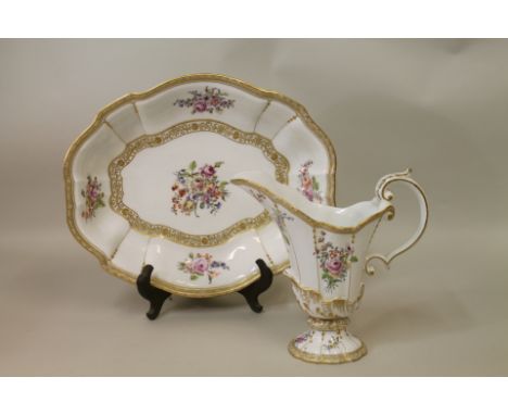 Good Chelsea ewer & basin, the ewer of helmet "silver" shape with shell moulding & multi scroll handle, the basin of shallow 