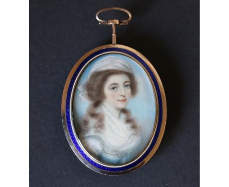 Late 18th century miniature portrait of a young woman with white bodice, bonnet & pearls, in gold frame with blue enamel bord