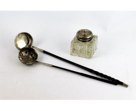 Georgian silver punch ladle with embossed animals, grapes and star, another, indistinctly marked, and a mounted glass inkwell
