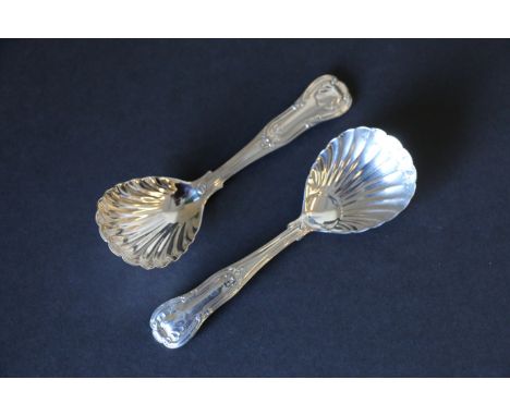 Pair of silver caddy spoons of hourglass pattern with scallop bowls, by Eley & Fearn, 1823. Condition Report. Good weight pos