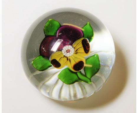 Baccarat lamp work paperweight of a pansy, star cut base,5cm diam.