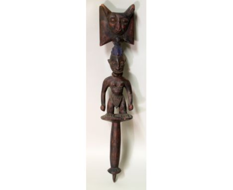 19th or early 20th century Nigerian Yoruba wooden Shango staff or wand, the male figure holding two clubs with Janus thunder 
