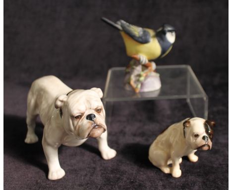 Royal Doulton figure of a standing bulldog, 12.5cm long; also a smaller seated Royal Doulton bulldog and a Royal Worcester Gr