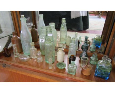 Shelf of old bottles etc