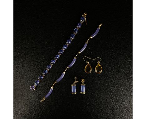 A Chinese 14k gold and carved lavender jade bracelet with pierced Chinese character 'Fu' links along with a pair of matching 