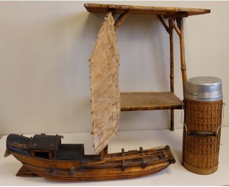 A Chinese model Junk ship or Sampan marked with Chinese characters along with a two tier bamboo occasional table and a woven 