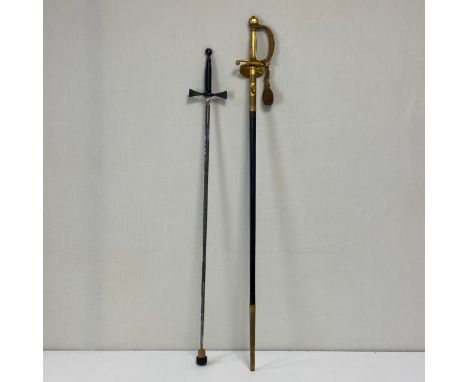 A 20th century English court sword having a gilt brass foliate engraved handle and guard bound in a metal thread needlework s