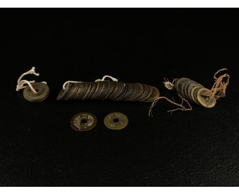 A collection of 18th century Chinese Qing dynasty and later Qianlong Tongbao and other base metal coins with four character m