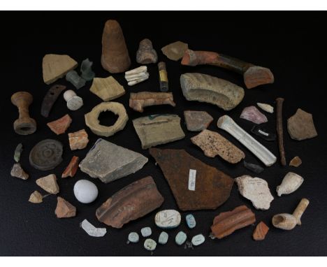 A large mixed collection of ancient artefacts to include a conical piece of terracotta from the Temple of Karnak Luxor, piece