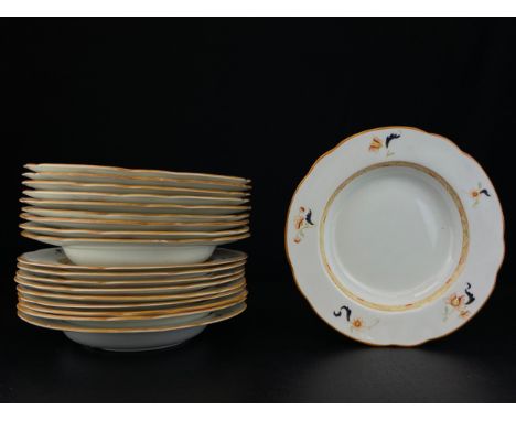 A matched set of ten Wedgewood bowls and nine plates with maker's marks to the base. W.24.5cm