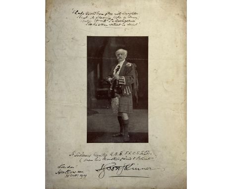An early 20th century portrait photograph of the fiddler and composer James Scott Skinner in Scottish dress holding a violin 