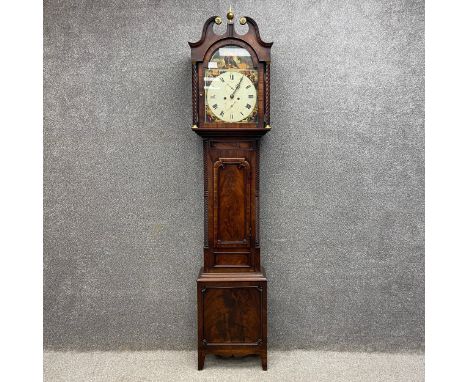 An 18th century Scottish mahogany longcase clock having a scrolling shaped and moulded breakfront pediment with a central bra