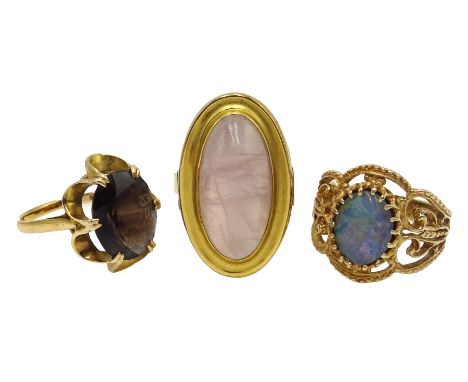 Gold opal filigree set ring, gold smoky quartz ring, both hallmarked 9ct and gold-plated oval cabochon pink quartz ring Condi