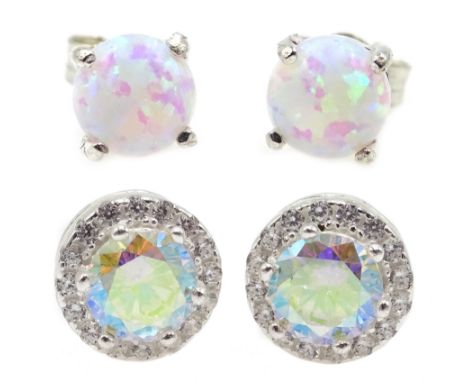 Pair of opal silver stud earrings and a pair of silver cubic zirconia cluster ear-rings