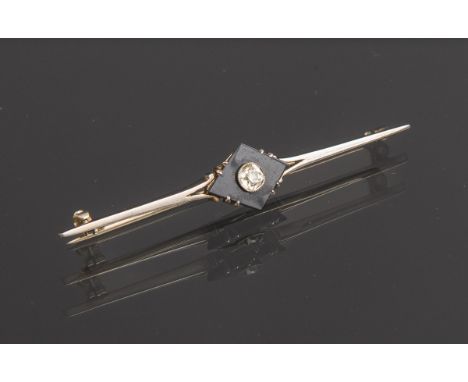 Stabbrosche mit Diamantbesatz 585 WG, besetzt m. 1 Diamant im Old European Cut von ca. 0.2ct u. 1 rautenförmiger Onyx-Platte,