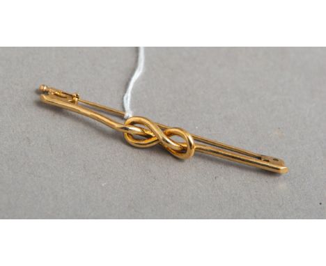 Brosche 585 GG (wohl 50/60er J.), Schauseite m. gearb. Knoten, gestempelt: Feingehalt, Gr.ca. L: 5,4 cm, Gewicht ca. 3,65 g.