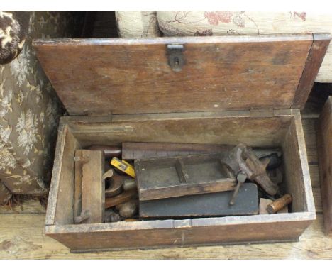 A box of various tools plus a quantity of clay flower pots