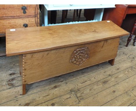 A carved light oak blanket chest by Jack Grimble of Cromer