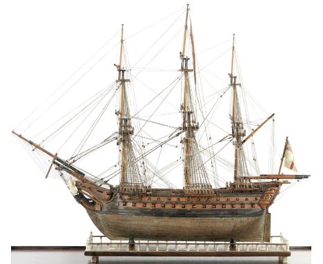 A fine Prisoner-of-War boxwood model of the first class ship of the line HMS Foudroyant,  French,  early 19th century,the cop