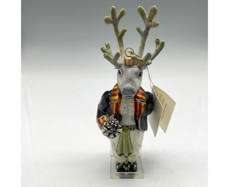 Handcrafted, mouth blown glass ornament is hand painted to create his unique butler attire. Wearing a short black jacket with