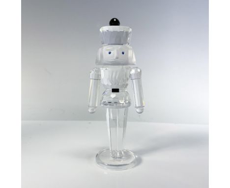 Part of the Exquisite Accents collection. Crystal figural standing at attention with blue crystal eyes, frosted face, and jet