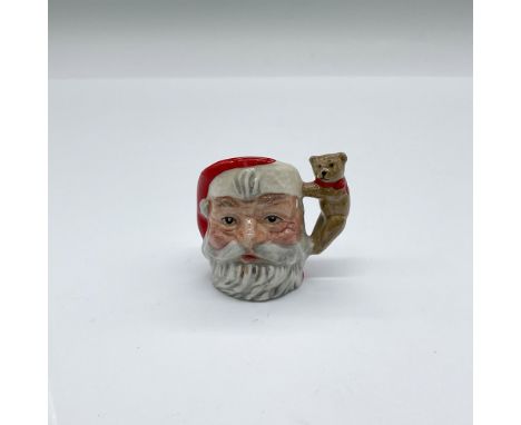 Commissioned by Seaway China Marine City in a special edition of 2,500. Red and white figural jug of Santa. Brown teddy bear 
