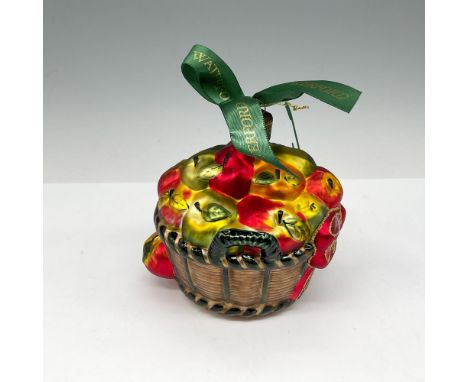 This handmade vibrant colored ornament in orange, red, yellow and green inside brown basket will make a wonderful addition to