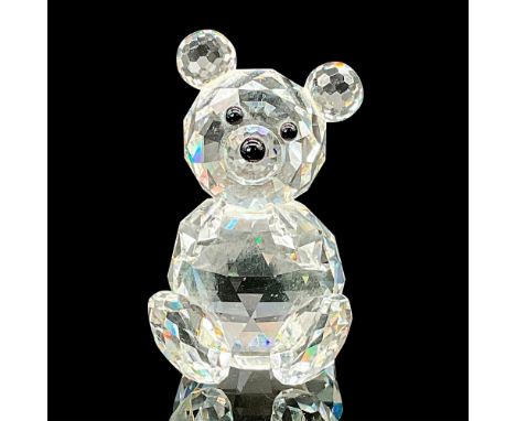 This Swarovski Silver Crystal teddy bear can be found with head tilted in either direction and is made of clear facetted crys