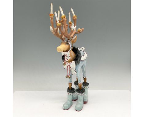 I can't imagine more festive decorative items, from the candles on his antlers to the bows and bells and his red, white and b