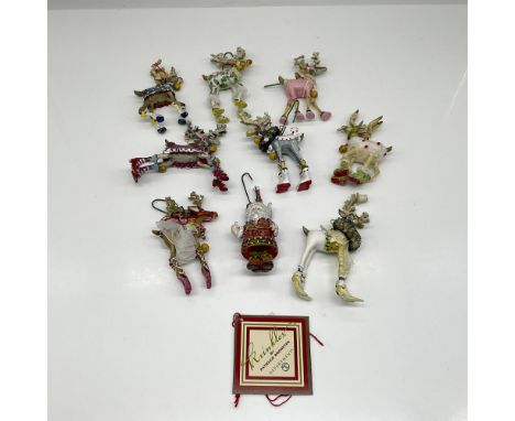 From the imagination of Patience Brewster, she's created a group of eye catching, colorful and whimsical ornaments for your t