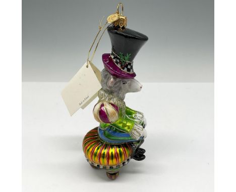 Handcrafted, mouth blown glass ornament that is hand painted with vibrant colors and creative fashion statements. Mr. Woolens