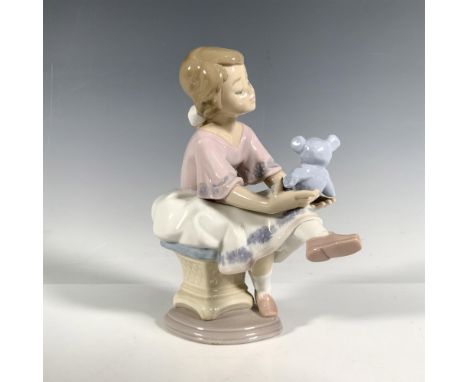 Glossy finish; Lladro backstamp. Includes original box. Dimensions of the box: 10"L x 9"W x 6.25"H.Artist: Francisco PolopeIs