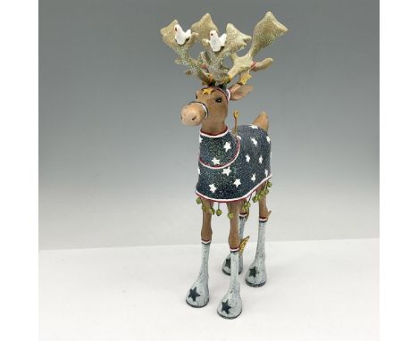 Large table decoration reindeer displaying his patriotism. Colored in red, white and blue blanket with stars, boots with star