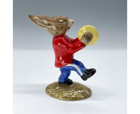 With a red coat and blue pants, this adorable figurine marching happily along with his cymbals. Royal Doulton and Golden Jubi