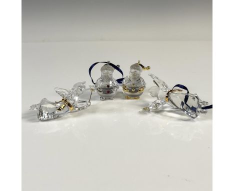 Festive crystal ornaments with satin ribbon to hang. Lot includes 2 Santas, one with rhodium accents and one gilt accented or