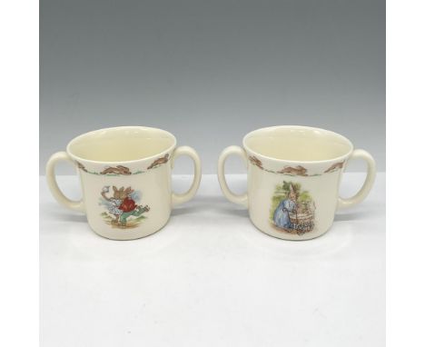 Bone China mug with bunny family life scenes. Royal Doulton backstamp. This item has its original box: 4"L x 4"W x 4"H. Issue