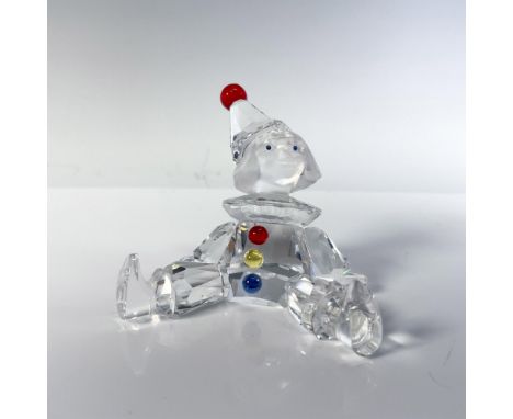 Part of the When we were young series. Figural has clear crystal body with frosted face, blue eyes and red crystal pom-pom on