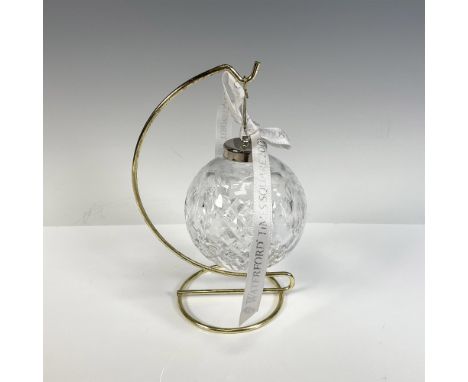 Elegant cut crystal globe ornament comes with gilt metal hanger. Waterford mark. Issued: 2001Dimensions: 6.5"H x 3.25" dia.Ma