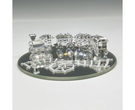 Part of the When We Were Young group. Includes a locomotive with three identical carriages. This item has a round mirrored ba
