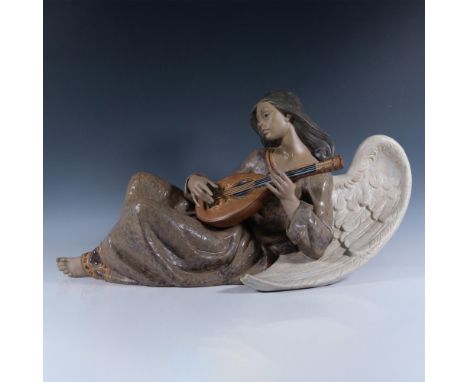 Limited edition. Beautiful, angelic figure of an angel playing the mandolin. Signed by artist. Lladro backstamp. Artist: Jose