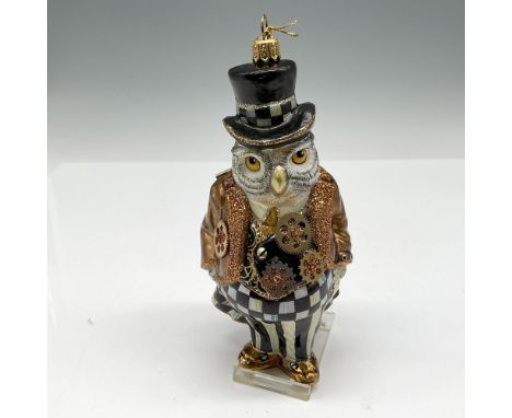 Handcrafted, mouth blown glass ornament that is hand painted and embellished with gears, glitter on his jacket and vest weari