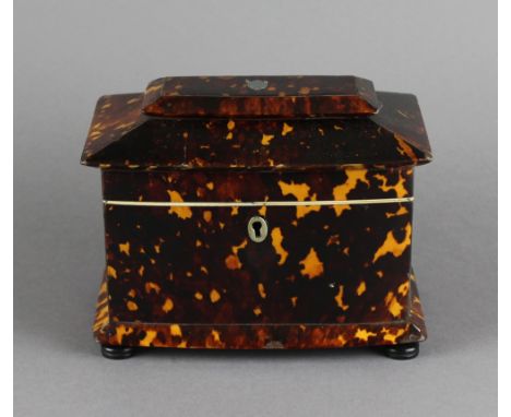 A 19th century tortoiseshell tea caddy, of traditional design.  13cm high x 17cm wide x 10.5cm deep. Slight losses and minor 