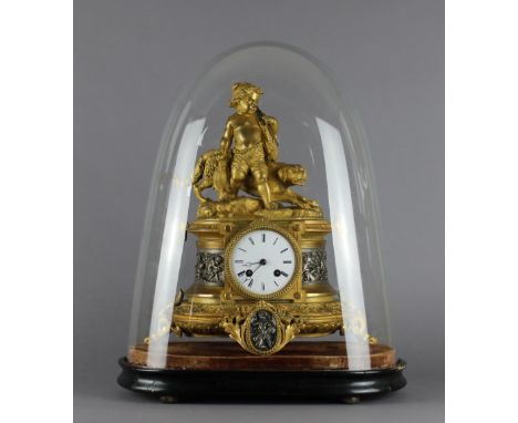 A 19th Century French gilded and silvered spelter mantel clock, the 8.5cm white porcelain dial to the eight day two train mov